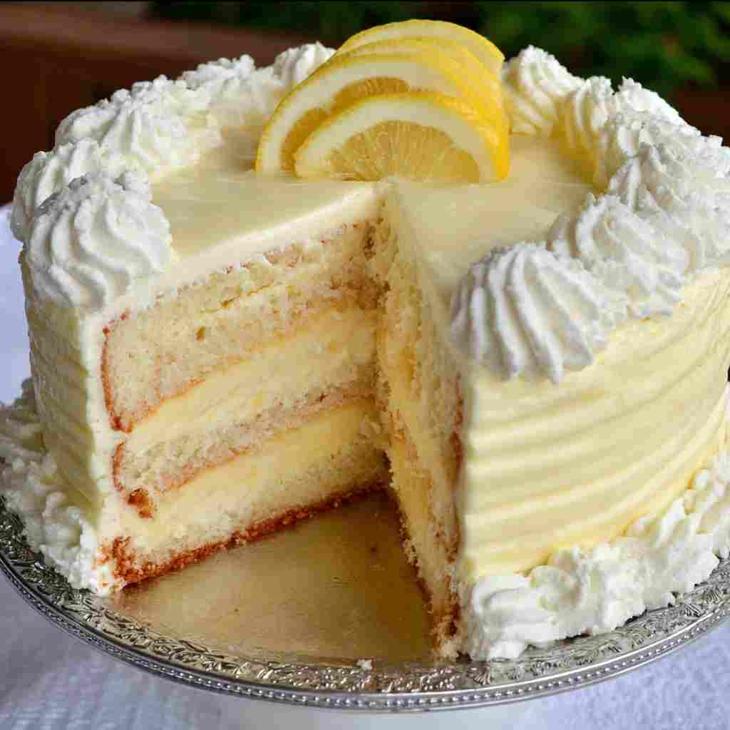 Easy Lemon Cheesecake Cake - tender with a light drizzle of sweet glaze