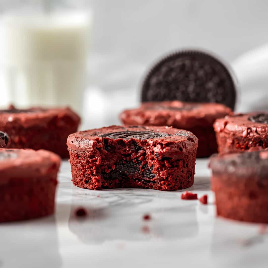 Red Velvet Oreo Truffle Brownies - rich fudgy consistency with glossy chocolate finish with chopped toasted nuts