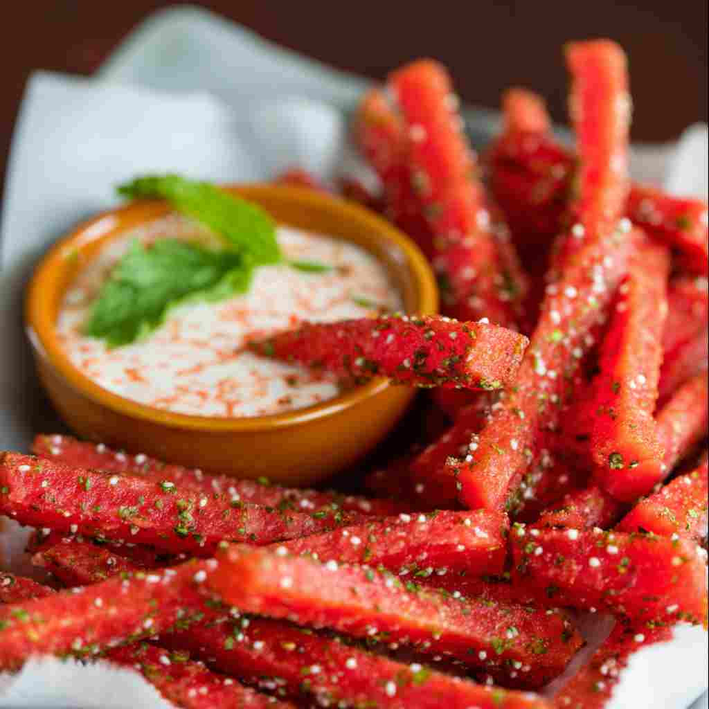 Spicy Watermelon Fries Recipe - smooth creamy dipping consistency with baked bubbly top with chopped parsley and grated cheese